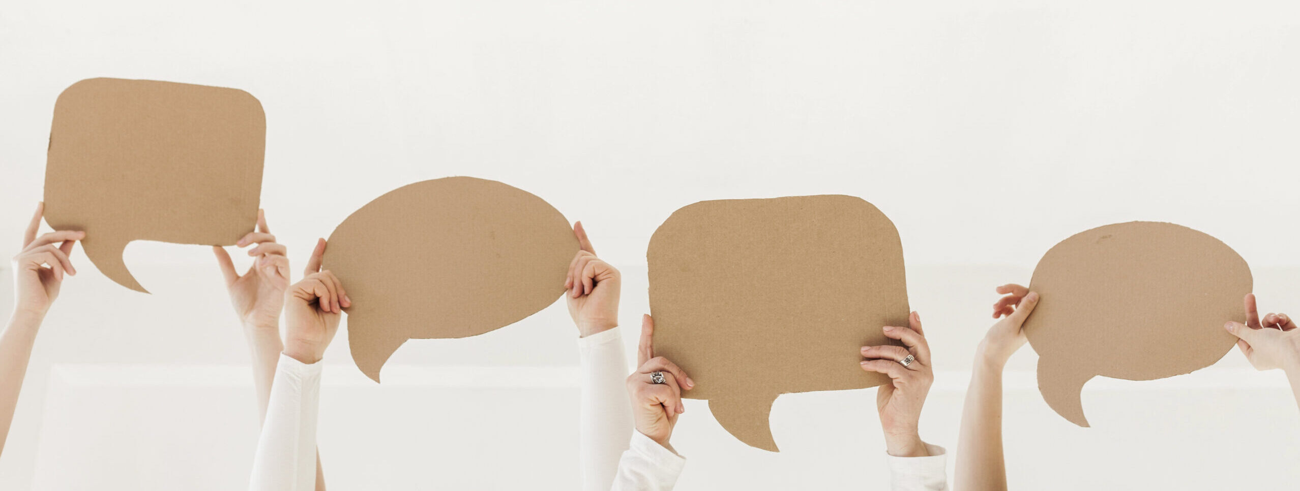 group-women-hands-holding-chat-bubbles